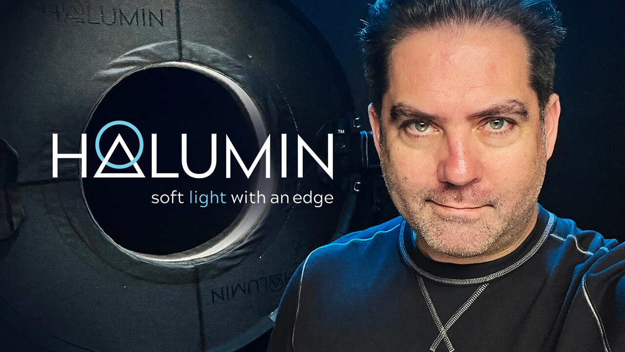 Jeremy Mason McGraw, Inventor and Founder of Halumin, next to a Halumin lighting device