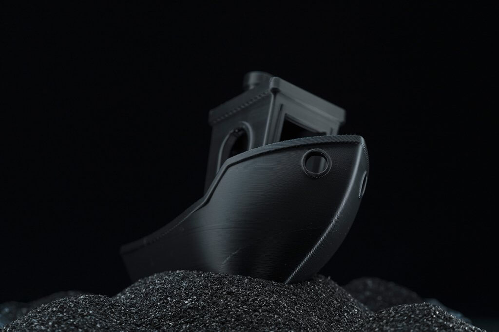 Black on Black Toy Photography Positioned Upstage in Halumin - 3D Printed Benchy