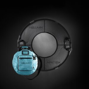 Halumin H18 open cylindrical lighting device with its teal carry case on a black background