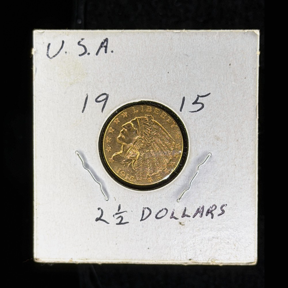 1915 Indian Head quarter eagle gold coin, obverse, in a cardboard 2x2 flip handwritten U.S.A. 1915 2 1/2 Dollars, photographed in Halumin-C
