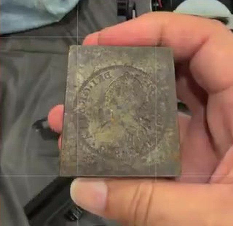 Coin die with the Carolus IIII portrait, held in the owner’s hand at the Cincinnati coin show