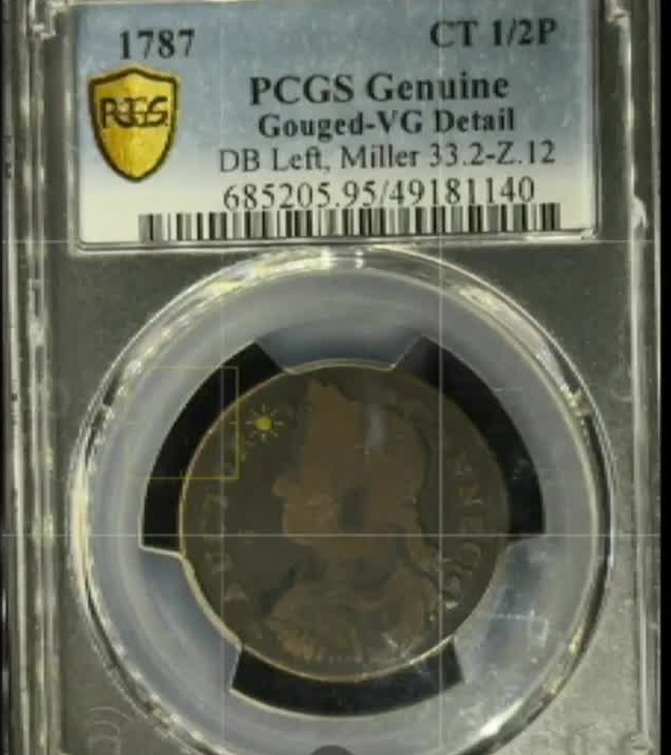 The same 1787 Connecticut copper in its PCGS slab under the Halumin-C tone light plus one side of the halo, with clear detail and patina