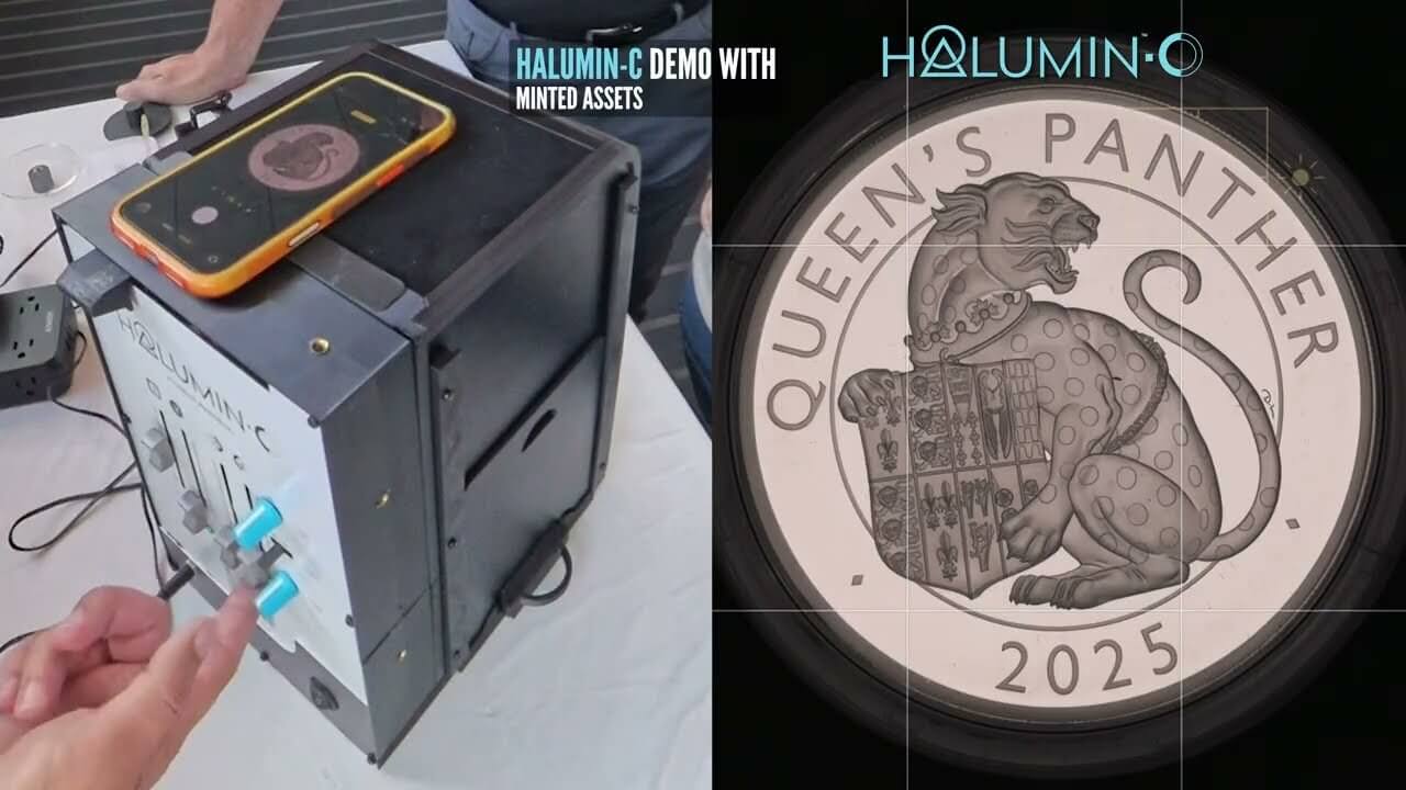 Hand adjusting the Halumin-C light sliders while the Queen's Panther silver proof shows a bright, milky field on screen