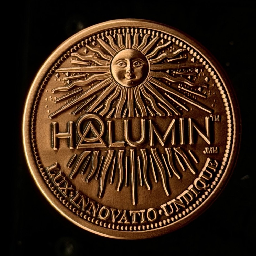Halumin 1 oz copper coin obverse with sun and HALUMIN logo